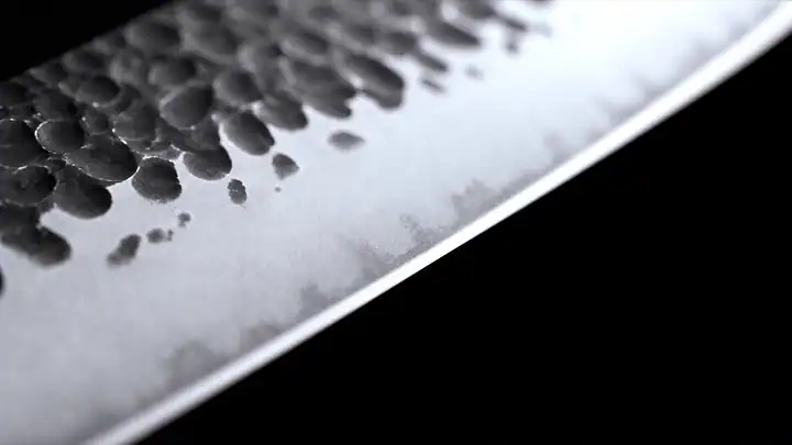 The dark, hammered kurouchi finish of an Oni Craft knife