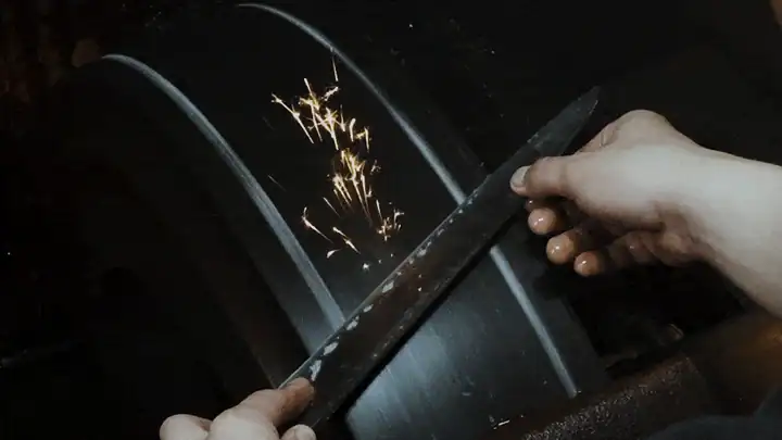 Close-up of an Oni Craft blade in AUS-10 steel